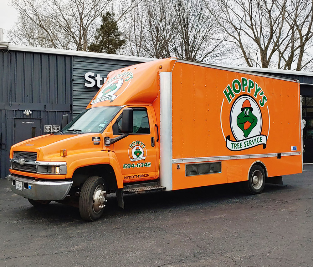 Hoppy's Tree Service truck graphics
