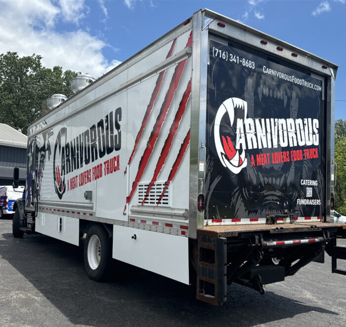Carnivorous food truck wrap